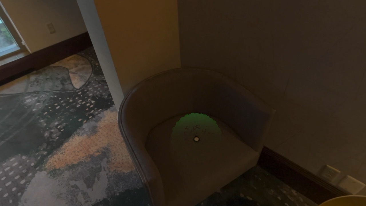 The sphere turned green and collapsing onto the chair seat