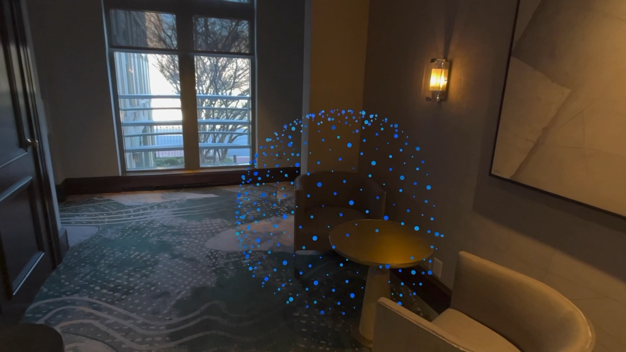 The blue sphere, larger now, around a chair